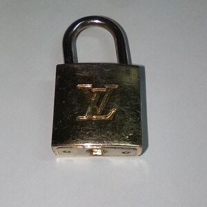 Louis Vuitton Shiny Gold Little Lock Sold On Handbags